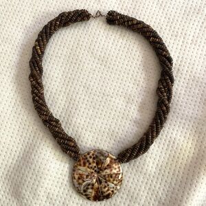 Boho wooden disk w/ cowrie shell Necklace